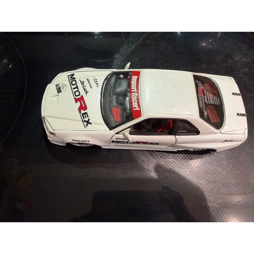 Jada Toys Import Racer Nissan Skyline GT-R R34 White MotoRex 1:24 Diecast Car